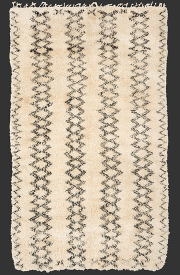 TM 2096, Beni Ouarain rug with unusual dense structure + a rare vertical design variant, north-eastern Middle Atlas, Morocco, 1990s, ca. 335 x 205 cm (11' x 6' 10''), high resolution image + price on request







