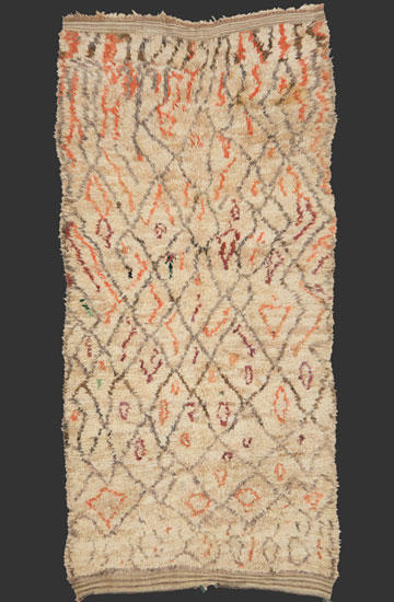 TM 2436, pile rug from the eastern High Atlas, Ait Yafelmane (?), with a dramatic version of a diamond drawing underlined by coloured filling motifs, deep pile + wild texture, Morocco, 1980s/90s, 340 x 160 cm (11' 2'' x 5' 8''), high resolution image + price on request







